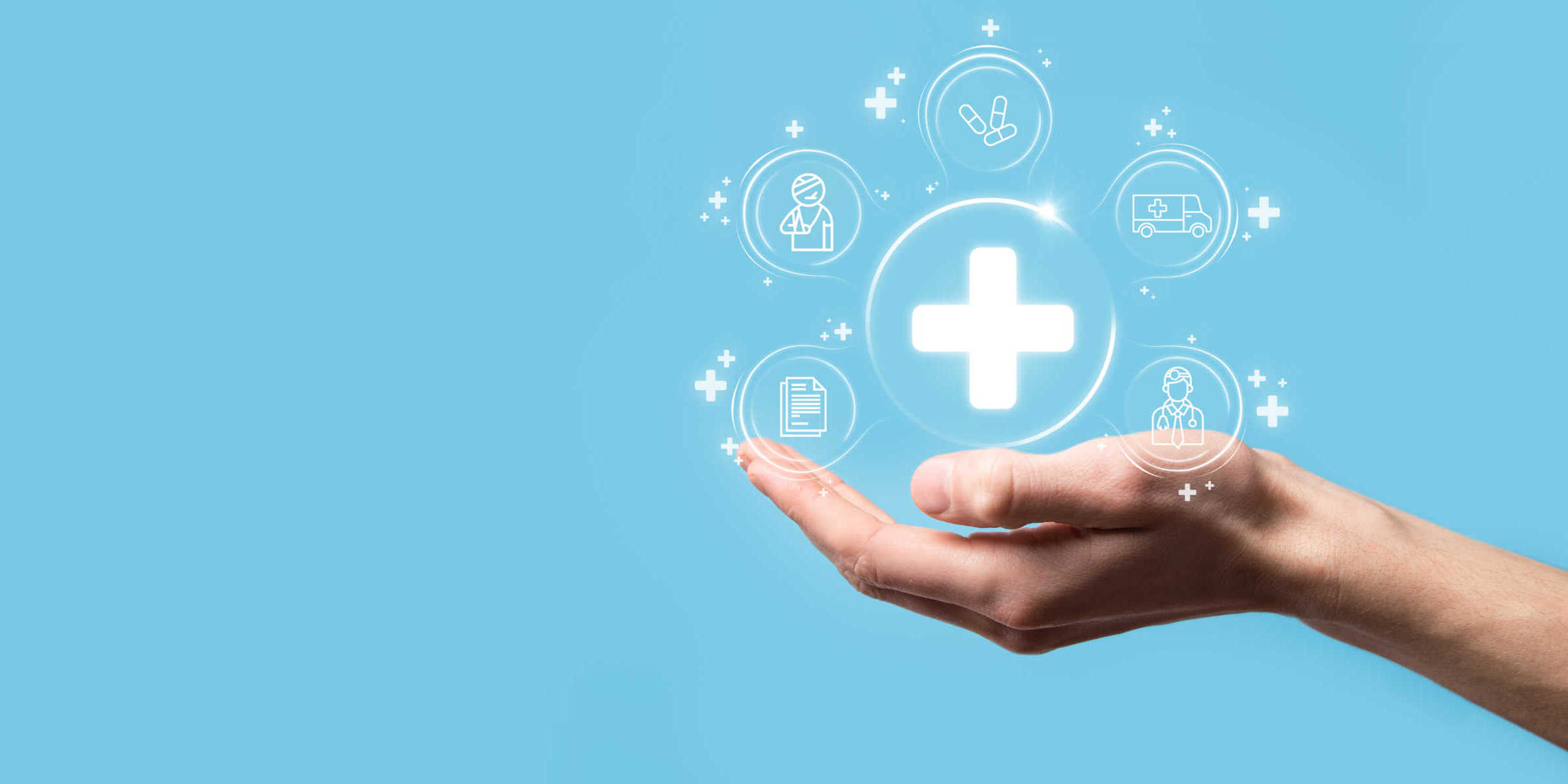 Businessman hold virtual plus medical network connection icons. Covid-19 pandemic develop people awareness and spread attention on their healthcare.Doctor,document,medicine,ambulance,patient icon. welfare aziendale